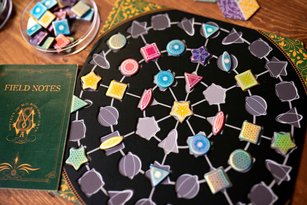 A top-down shot of a completed player mosaic in Diatoms the game.
