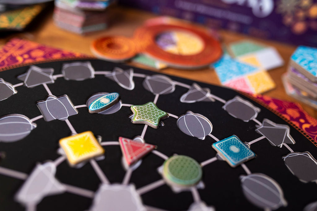 An extreme closeup of a Diatoms player board with diatom tiles on it.