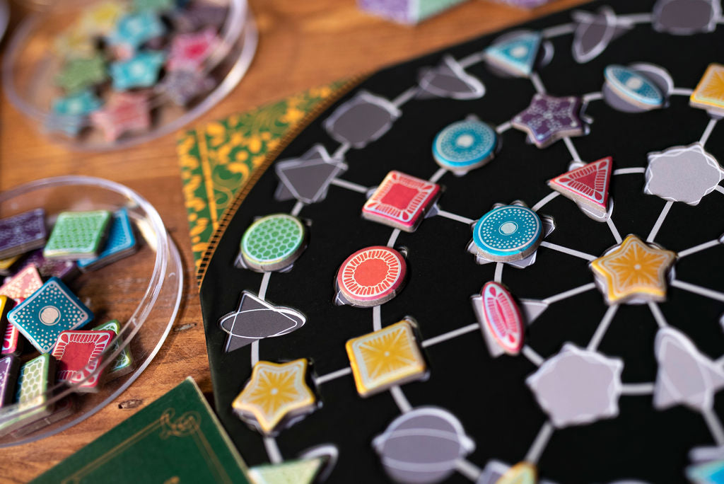 Closeup of a player board from Diatoms the board game